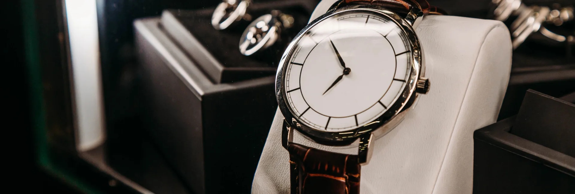 Inside Gold Mind Jewelers Sharon showcasing gold, diamonds, and luxury watches