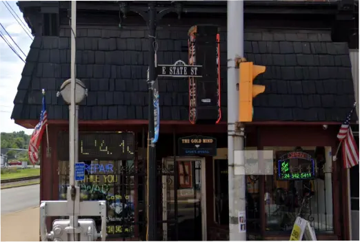 Inside Gold Mind Jewelers Sharon showcasing gold, diamonds, and luxury watches