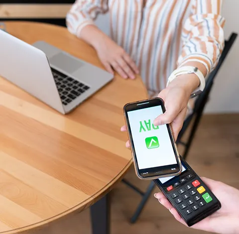 Expert evaluating antique jewelry and collectibles at Gold Mind Jewelers Sharon