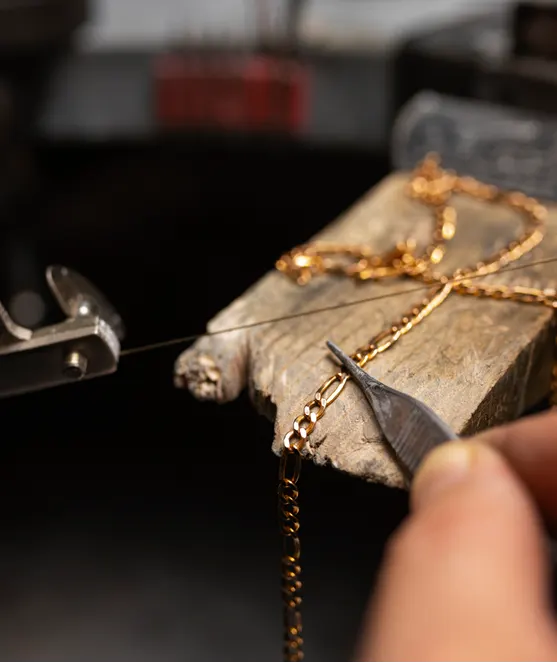 Inside Gold Mind Jewelers Sharon showcasing gold, diamonds, and luxury watches