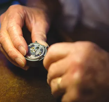 Inside Gold Mind Jewelers Sharon showcasing gold, diamonds, and luxury watches