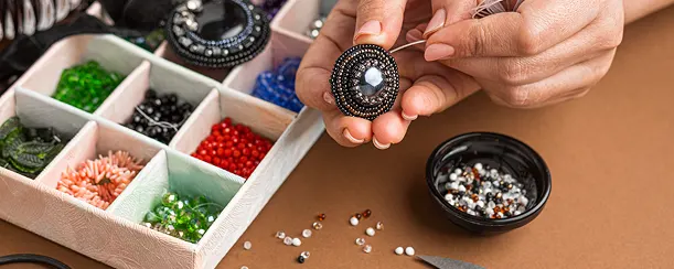 Customer selling antique and estate jewelry at Gold Mind Jewelers Sharon